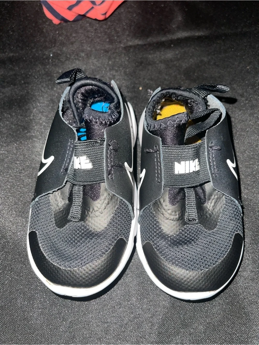 Nike Kids Black and White Slip-On Sneakers with Swoosh
